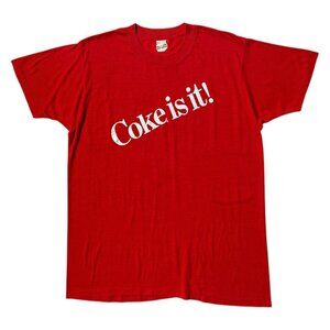 80s vintage Coke is it! Coca-cola t-shirt single stitch soda brand slogan.